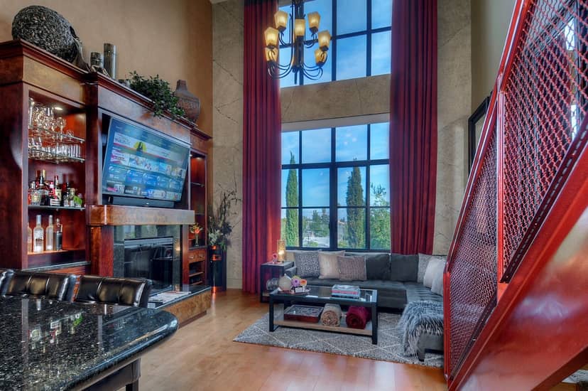 Fireside Room at Urban Sanctuary San Jose: elegant event space with natural light, ideal for gatherings.