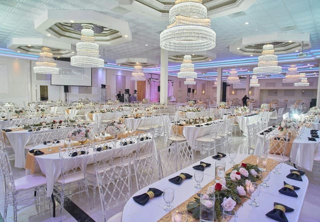 Elegant Grand Ballroom at Oasis Palace, ideal for weddings and events with chandeliers.