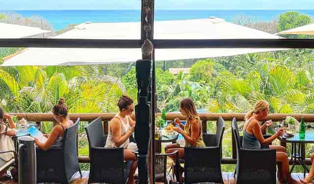 Open-air dining at Horizon Hotel Santa Teresa with ocean view, perfect for events and gatherings.