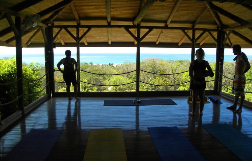 Yoga studio at Horizon Hotel Santa Teresa with coastal view, ideal for wellness retreats.