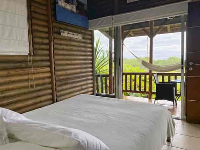 Yoga studio with wood accents at Horizon Hotel Santa Teresa for retreats and brainstorming sessions.