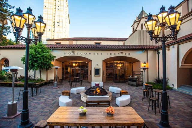 Montgomery Theater outdoor event space with stylish seating and fire pit for gatherings.