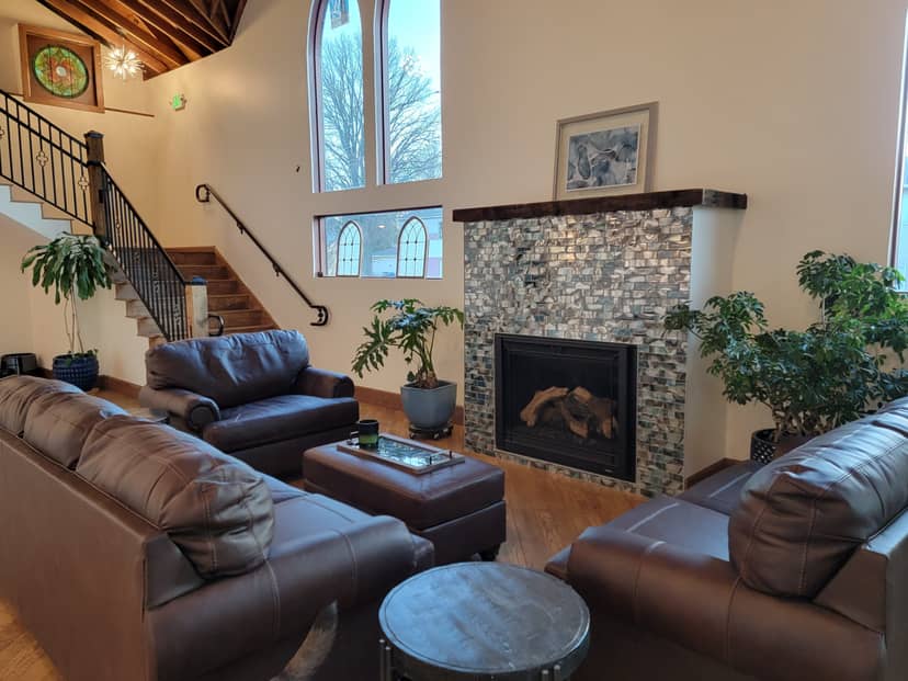 Welcoming lounge at The Sanctuary retreat center, ideal for gatherings and events.