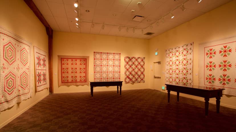 Vibrant quilt displays in Joint Gallery, ideal for art exhibitions and creative workshops.