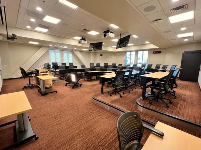 Traditional classroom with flexible seating for meetings and workshops at Santa Clara University.