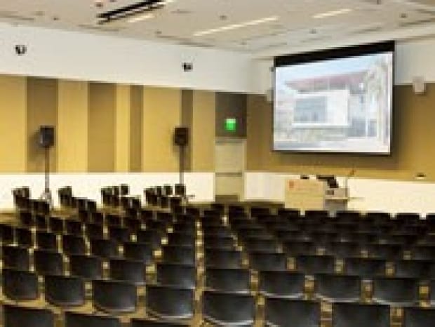 Berg Hall meeting space with black chairs, ideal for conferences and presentations.