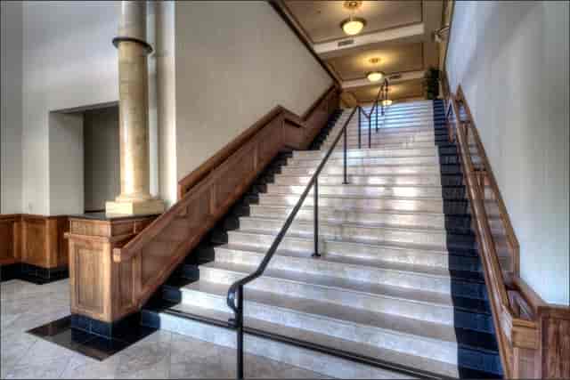 Grand staircase at Villa Ragusa conference center, elegant venue for events and meetings.