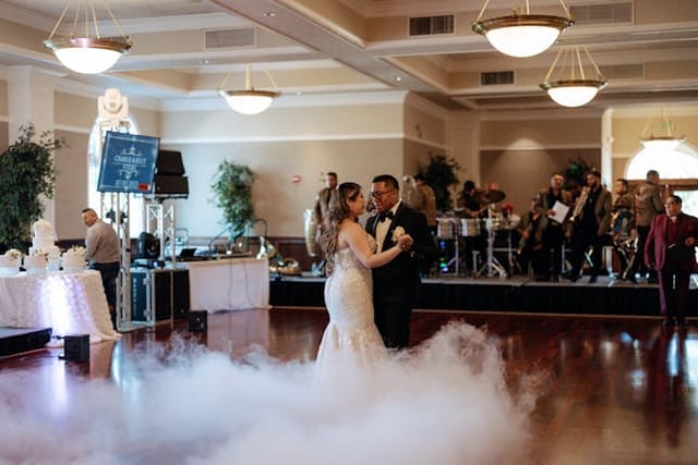 Newlyweds' first dance at a romantic Villa Ragusa wedding reception.