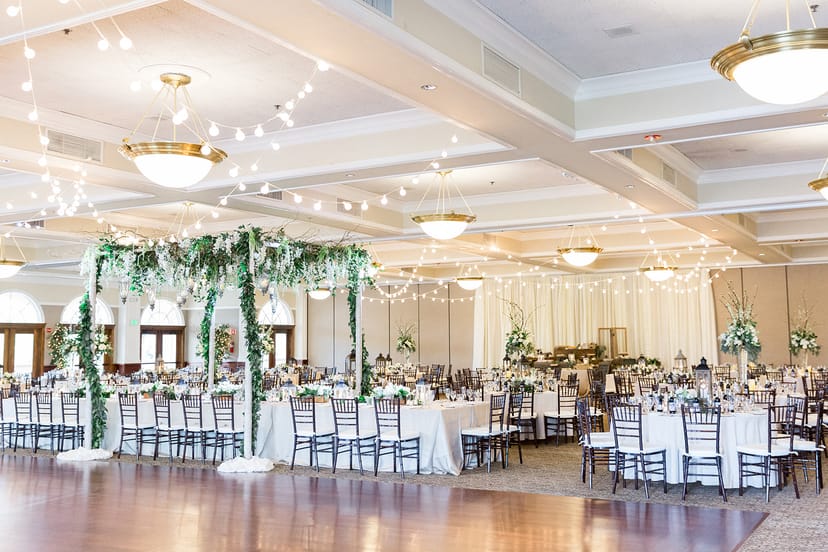 Elegant wedding venue at Campbell Gallery, adorned with string lights and floral decor.