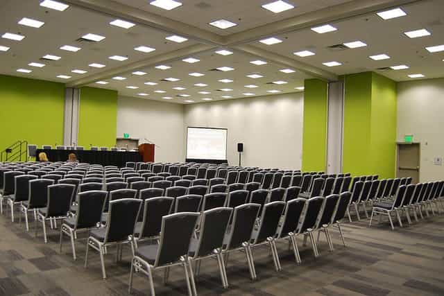 Modern ballroom in San Jose with arranged chairs for seminars and workshops.