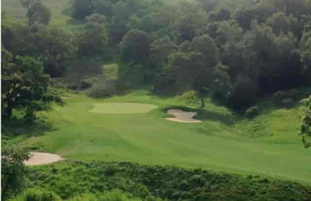 Lush golf course at Cinnabar Hills, perfect for corporate retreats and team-building events.