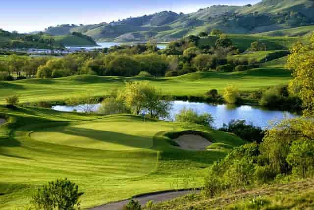 Indoor reception at Cinnabar Hills Golf Club with lush greenery, perfect for corporate events.