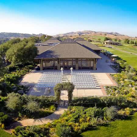 Outdoor venue at Cinnabar Hills Golf Club for weddings with lush landscaping.
