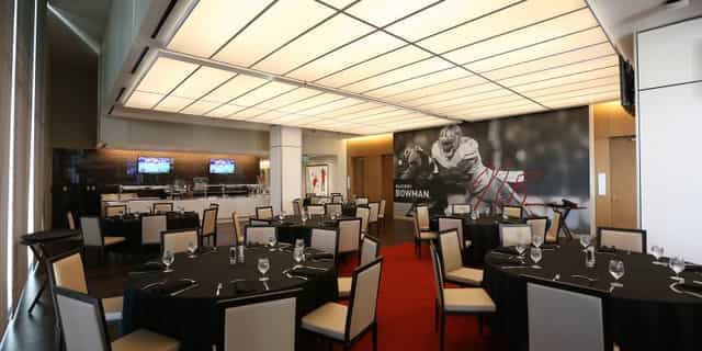 Event space at Levi's Stadium with round tables, ideal for corporate and celebratory events.