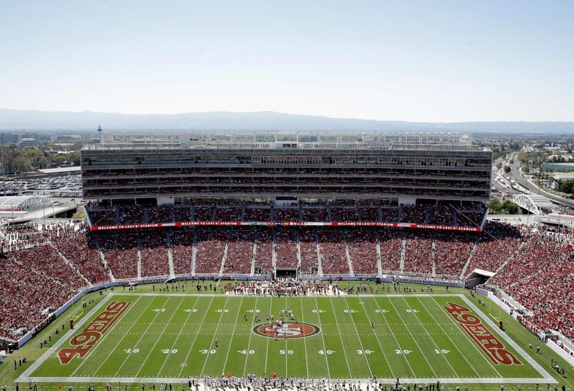 Levi's Stadium suites with cheering fans, perfect for concerts and sports events.