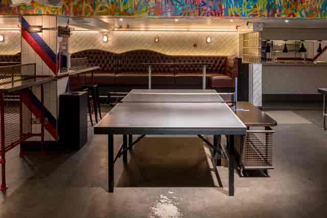 Versatile event space in Bounce Old Street, Shoreditch with modern tables for networking.