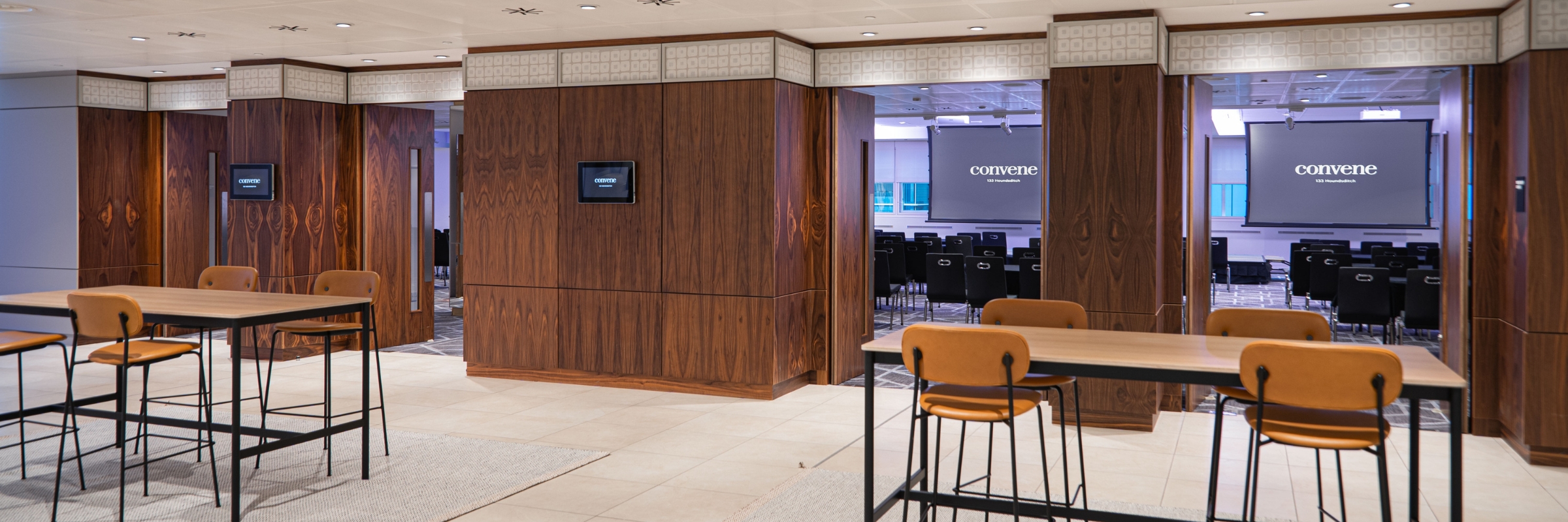 Modern conference space with wooden accents at Convene 133 Houndsditch for meetings and workshops. - Banner