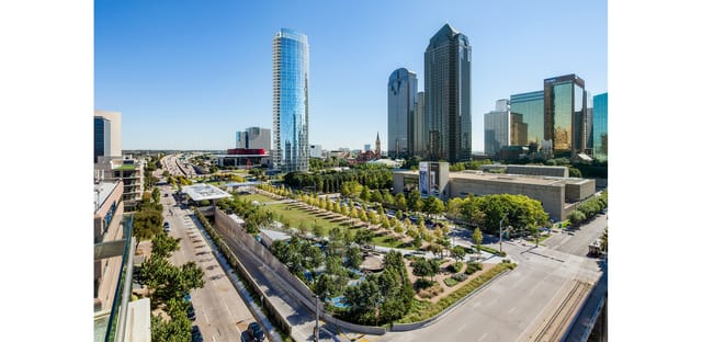 Klyde Warren Park cityscape, modern skyscrapers, ideal for events and conferences.
