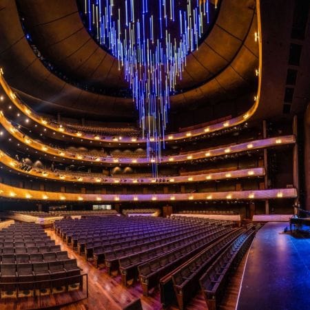 Margaret McDermott Performance Hall with elegant chandelier, ideal for events and performances.