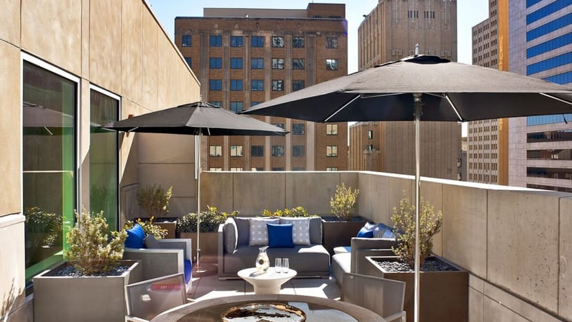 Stylish rooftop terrace at The Joule Dallas, perfect for outdoor events and networking.