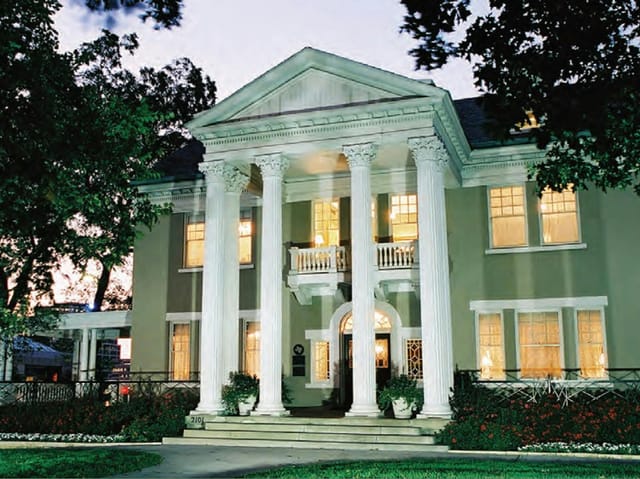 Elegant historic manor with columns, perfect for upscale events and meetings in Dallas.