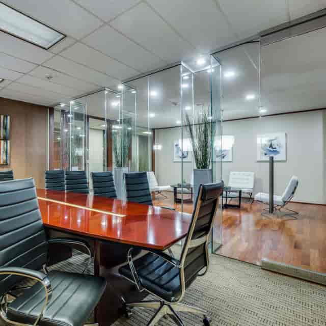 Modern conference room with glass walls in Dallas Bar Association for meetings and events.