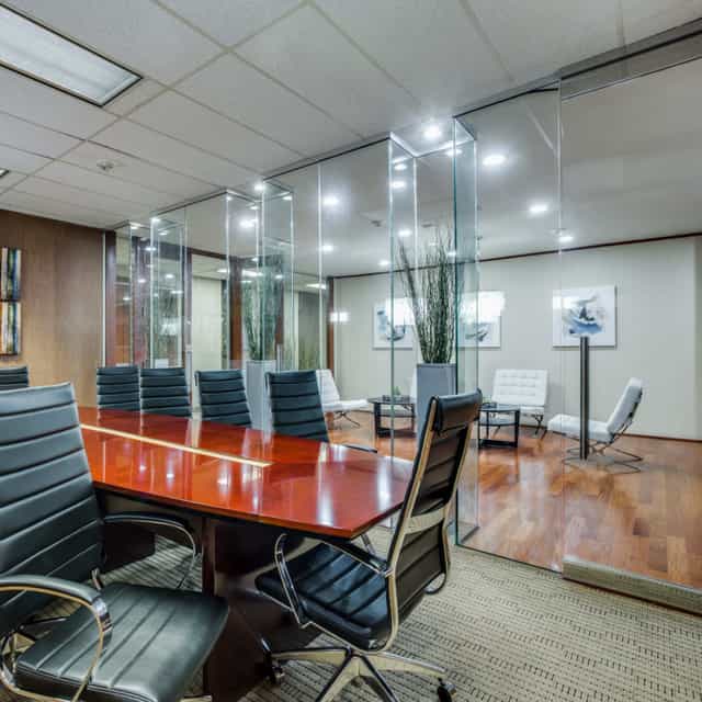 Modern conference room with glass walls in Dallas Bar Association for meetings and events.