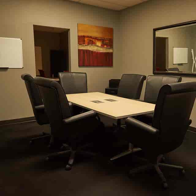 Dallas Bar Association conference room with central table, ideal for meetings and brainstorming.