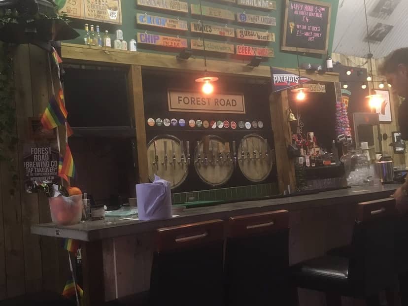 Rustic bar at Forest Road Brewery Taproom for social events and craft beverages.