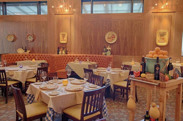 Private dining room at Ciao Bello with warm lighting for intimate gatherings and events.