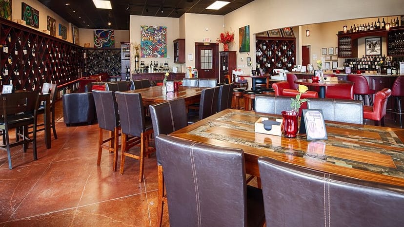 The Cellar event space with wooden tables, ideal for intimate gatherings and workshops.