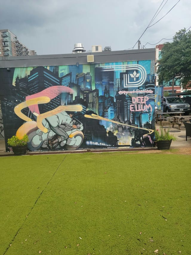 Vibrant mural at Deep Ellum Art Company, ideal for outdoor events and gatherings.