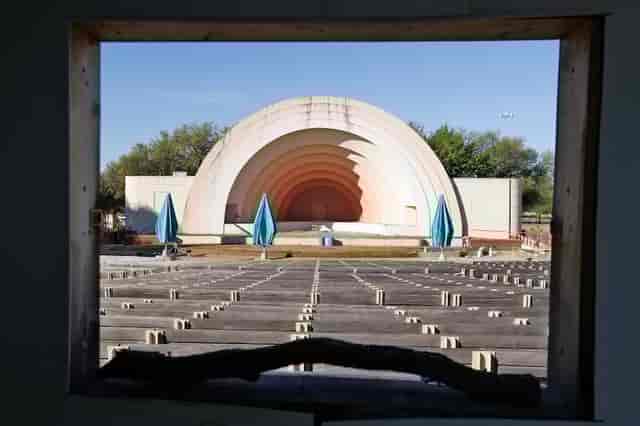Band Shell amphitheater in Fair Park, shell-shaped stage for concerts and events.