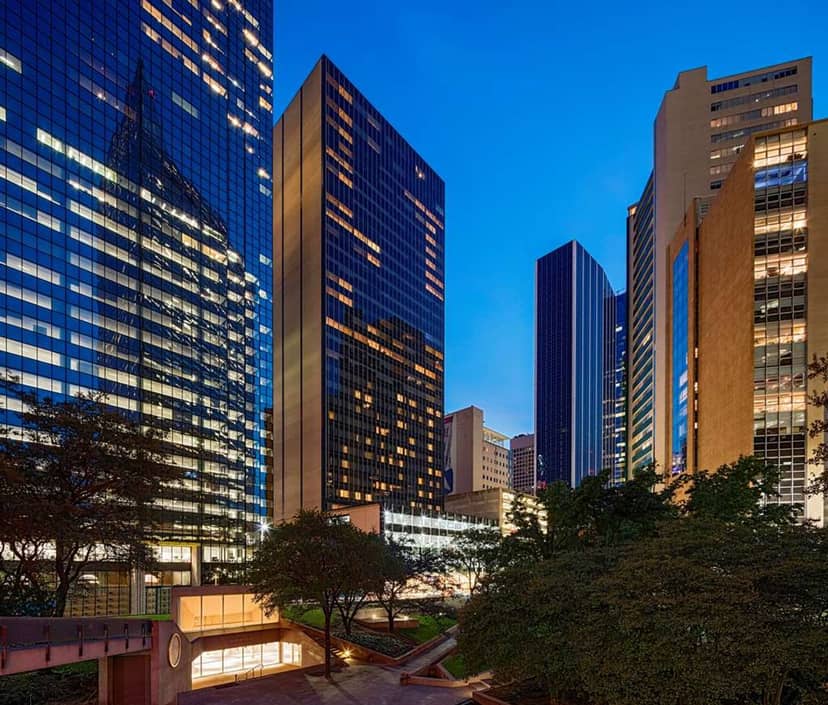 Hilton Garden Inn Downtown Dallas suites with urban skyline, ideal for corporate events.