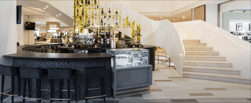 Modern bar area in upscale venue, perfect for networking events and cocktail receptions.