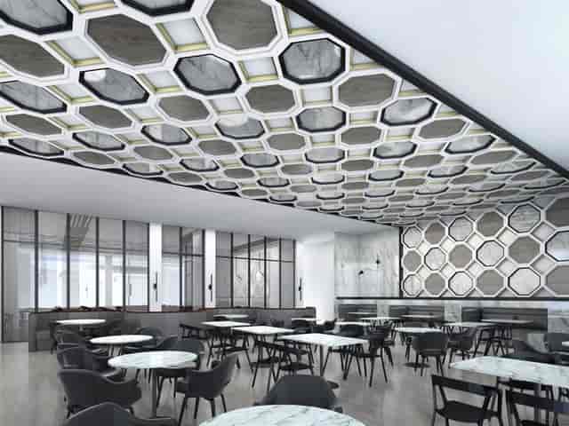 Modern dining room at 51fifteen with hexagonal ceiling, perfect for events and meetings.
