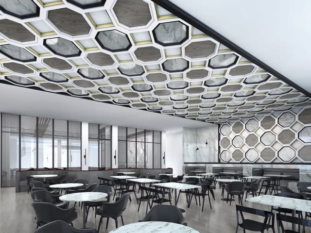 Modern dining room at 51fifteen with hexagonal ceiling, perfect for events and meetings.