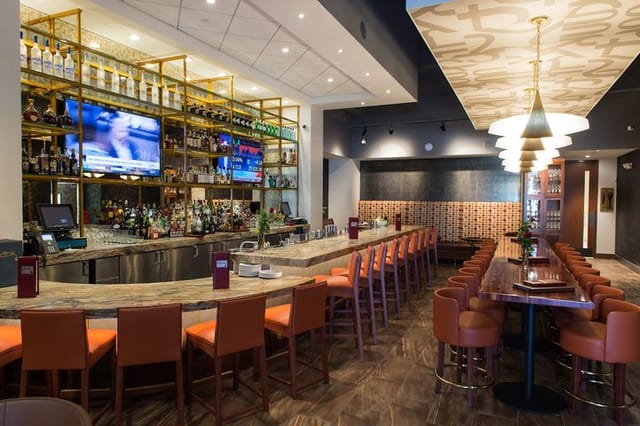 Maharaja Room at Kiran's: modern bar ideal for events and gatherings.