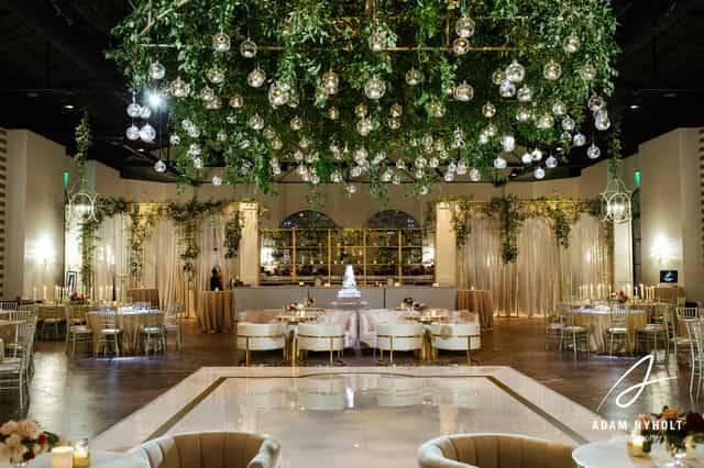 Champagne Suite at The Revaire: elegant wedding venue with lush greenery and ambient lighting.