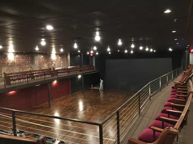 Private Suites at The Heights Theater with exposed brick, perfect for creative events.