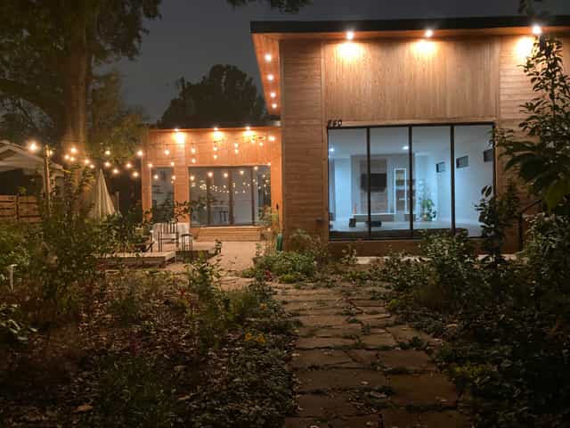 Private Suites at The Heights Theater, outdoor space with warm string lights for events.