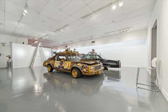 Art Car Museum exhibition gallery with vintage cars, ideal for immersive theme events.