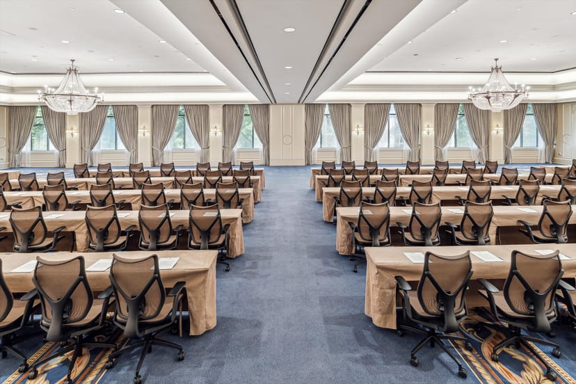 Ballroom at The Houstonian Hotel, featuring elegant chandeliers for professional events.