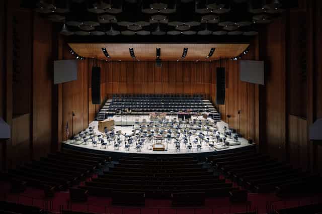 Lillie & Roy Cullen Theater, elegant concert hall with orchestra setup for performances.