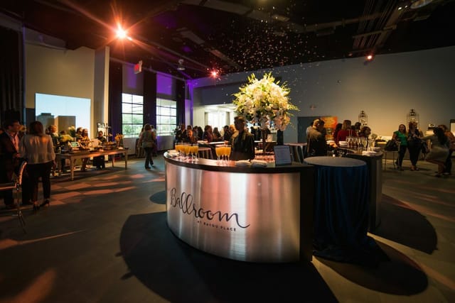 Curtain Call event space with stylish bar, perfect for networking and celebrations.