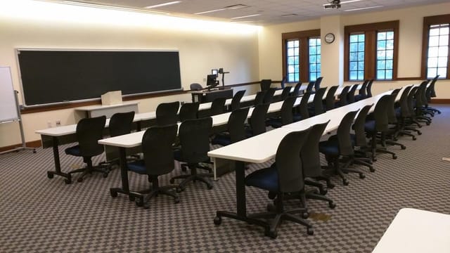 Function room at Rice University with classroom setup for corporate training and workshops.