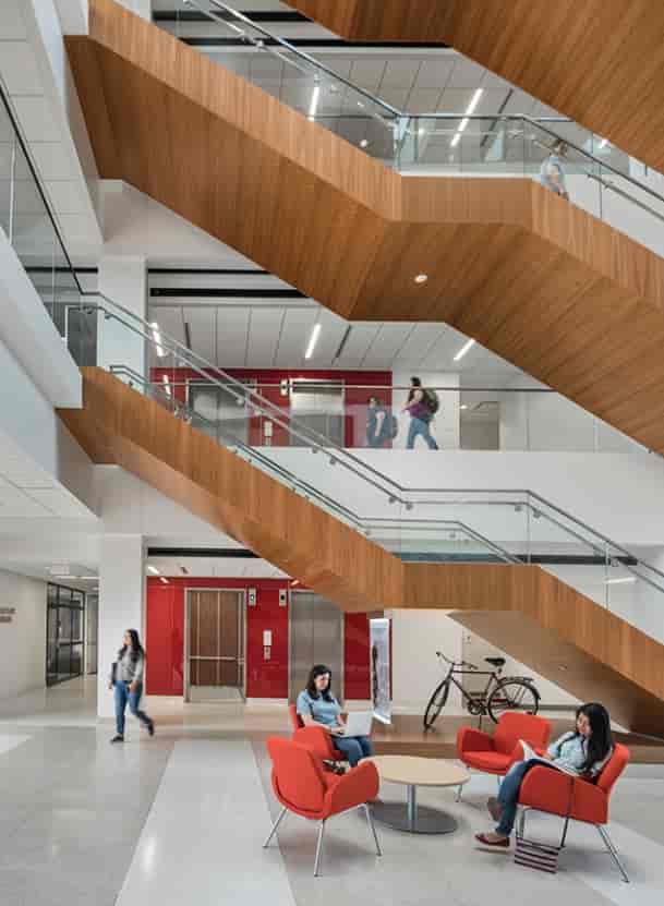 CSHP Atrium lobby at University of St. Thomas, modern seating, networking event space.