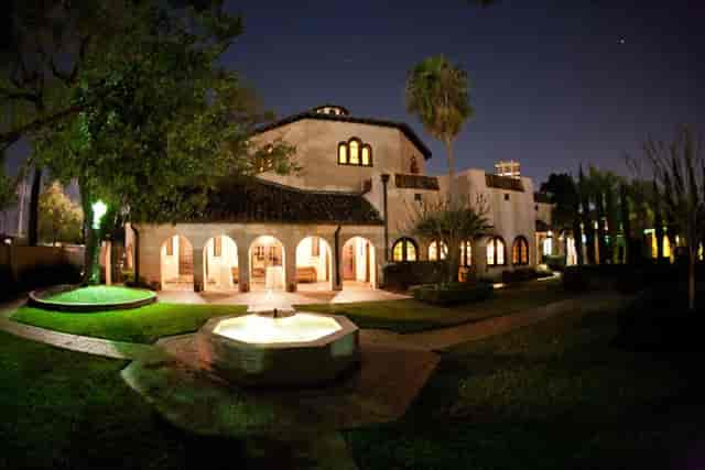 Cloister Room, elegant night venue with fountain for outdoor receptions and galas.