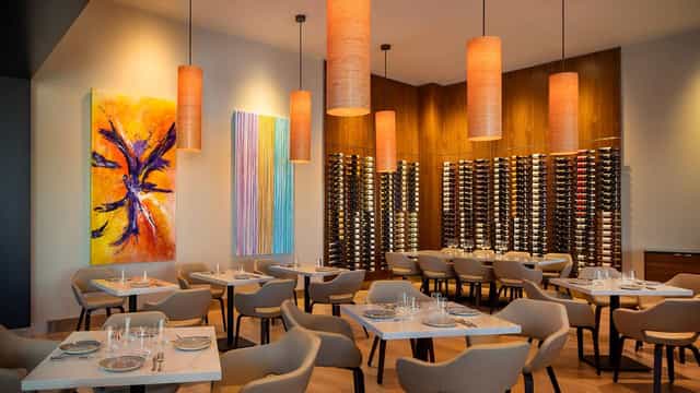 Stylish Terrace 54 restaurant with warm lighting, perfect for networking lunches or events.