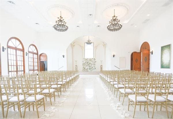 Empress Room in Citadel Houston: elegant wedding venue with chandeliers and sophisticated decor.